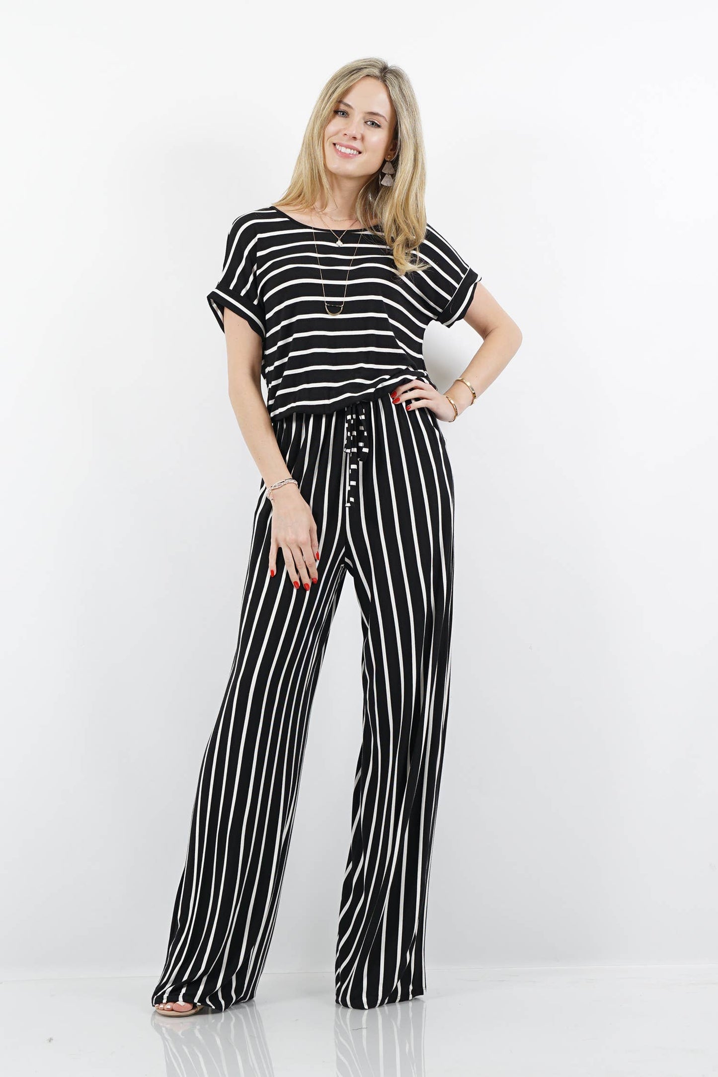STRIPED JUMPSUIT - Shamarr Barquet